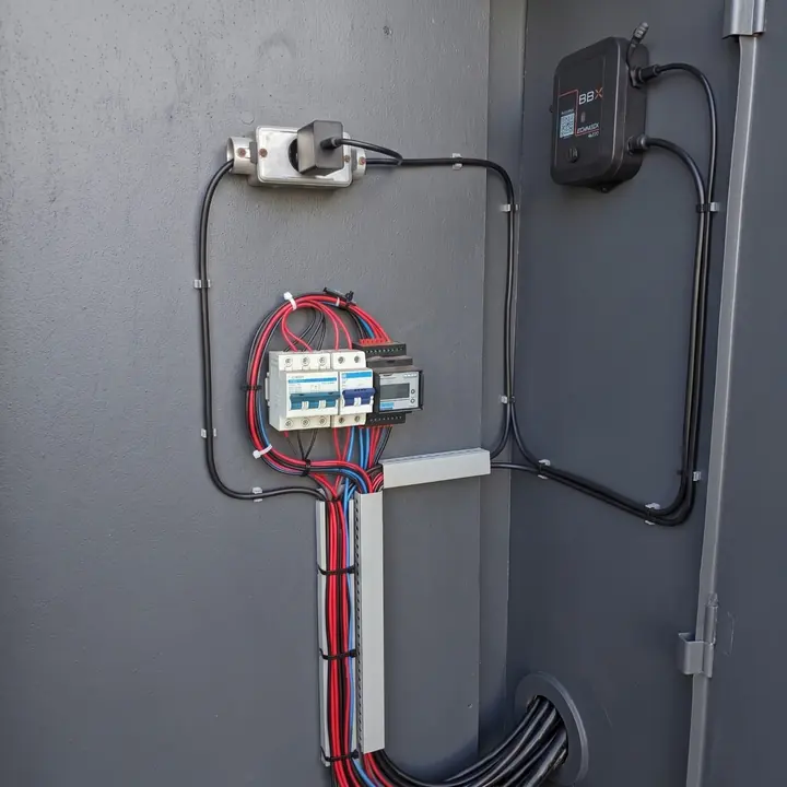 Node Connect next to an electrical panel, reading the field instruments.