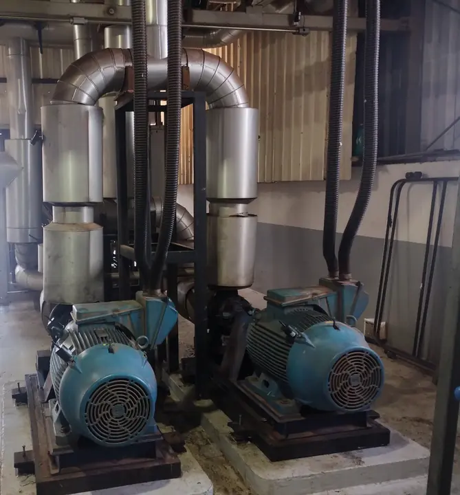 Motor-pump sets in an industrial plant monitored with Spectra sensors.