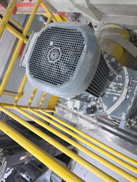 Electric motor seen from above on an industrial platform.